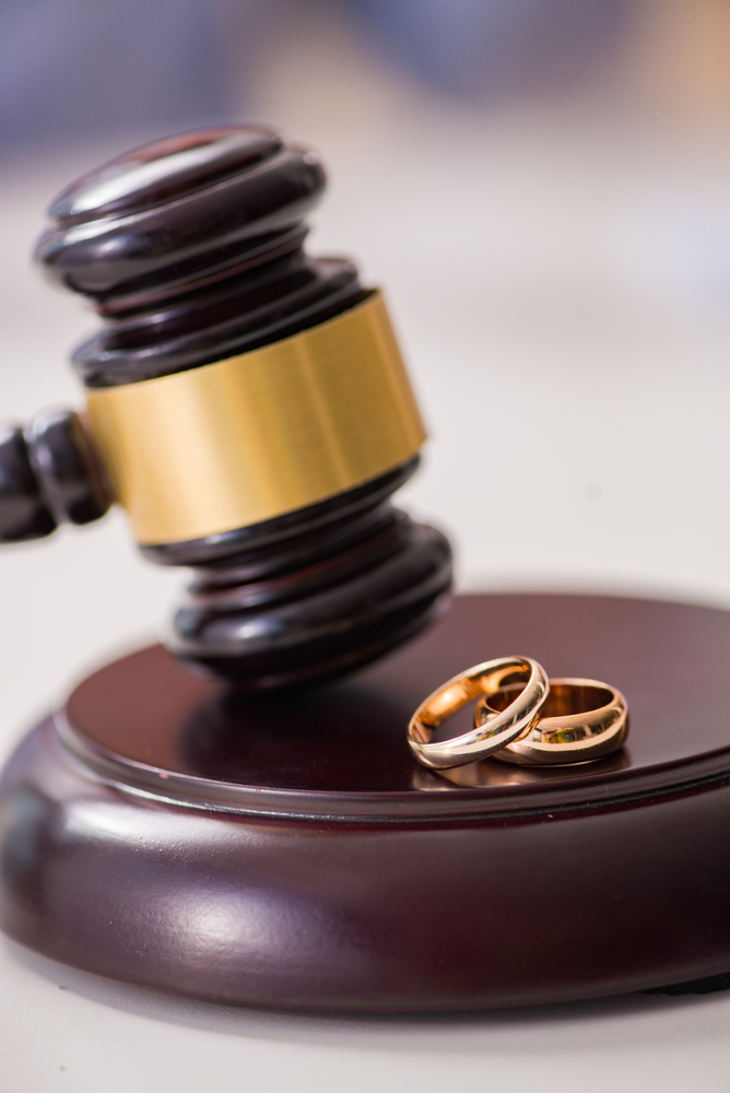 Divorce Lawyer - Gavel with gold wedding bands